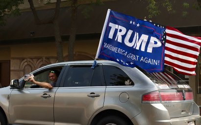 Another Trump supporter cruises through downtown Lemoore on Saturday before returning to the Hanford Mall.